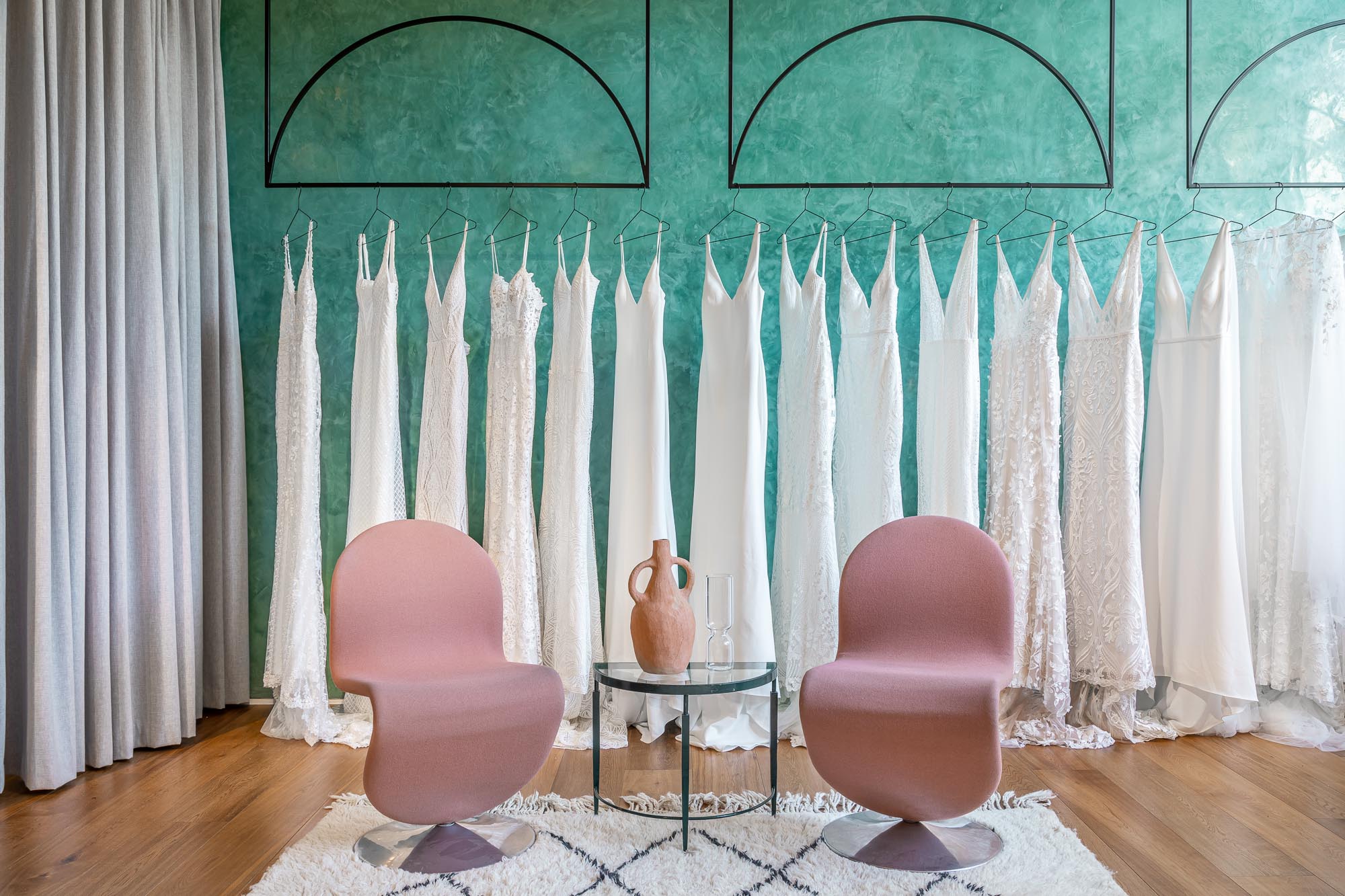 jonathan bond, interior photographer, pink designer chairs & half moon coffee table, made with love, london