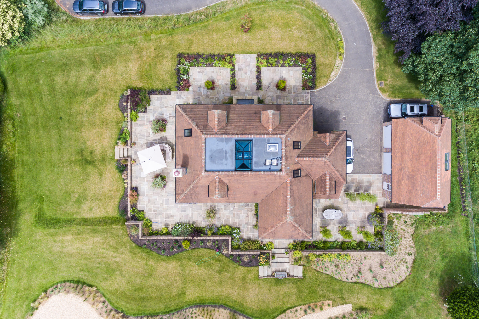 jonathan bond aerial photographer, detached residential house garden view