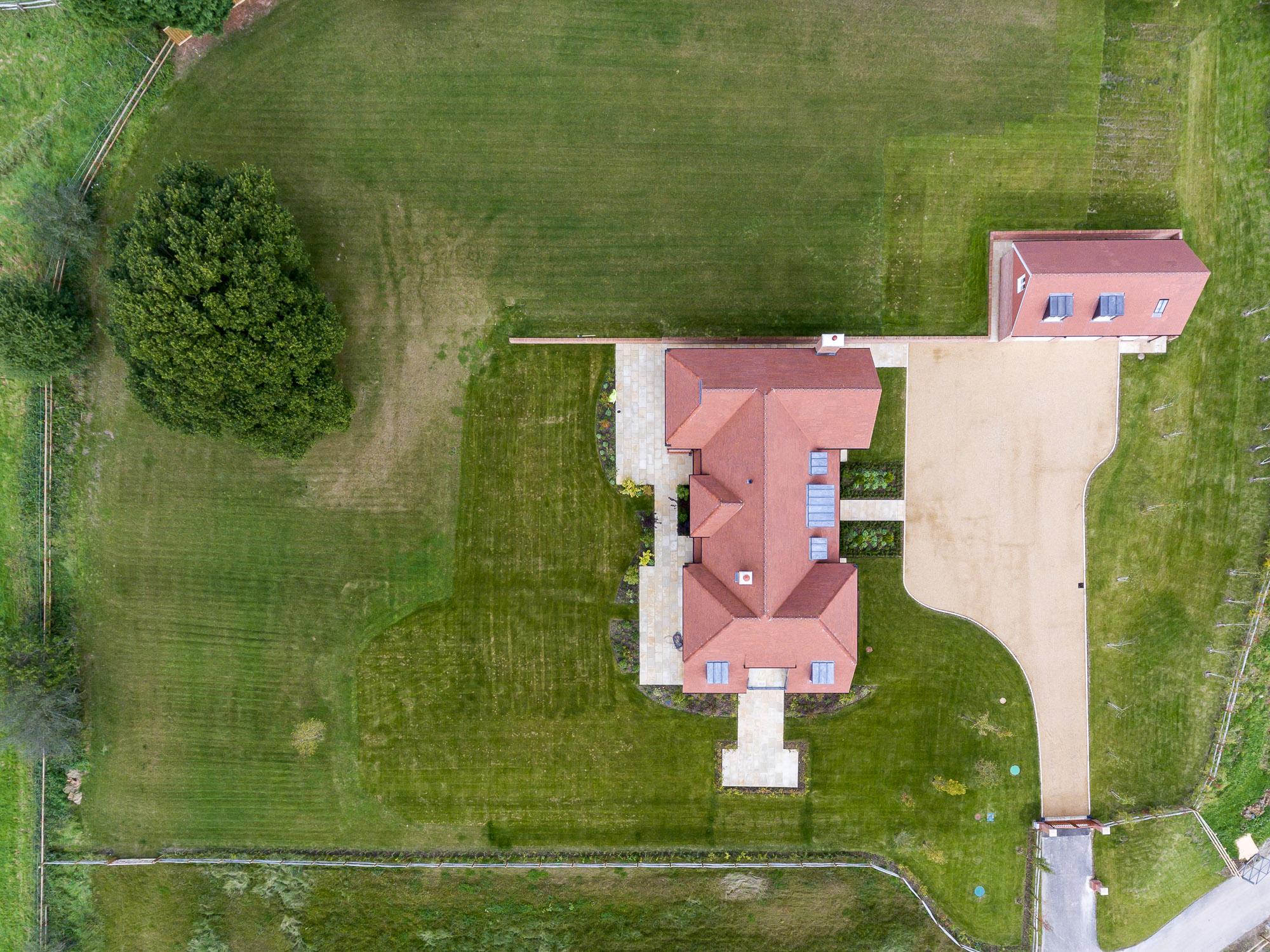 jonathan bond aerial photographer, aerial drone overhead view of residential house